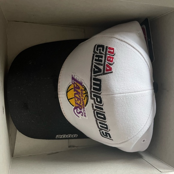 Lakers hat and magazine. Hat is new in box but has smudge on lid as pictured. - Picture 3 of 10